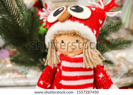 Cute Christmas holiday doll in red