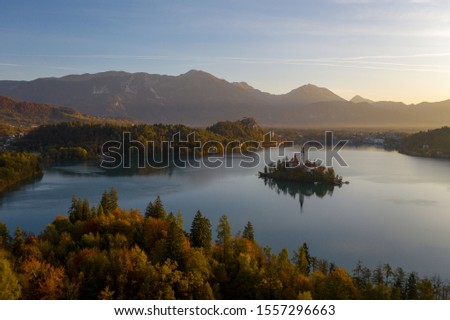 Colorful Autumn Sunrise Over Lake Bled with Church on Island, Slovenia