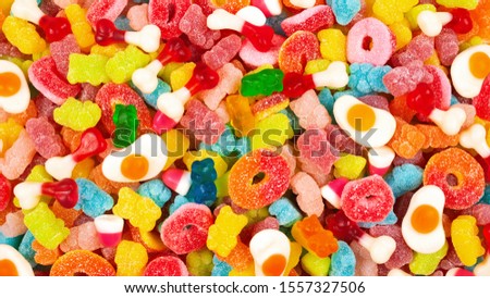 Assorted gummy candies. Top view. Jelly  sweets. Royalty-Free Stock Photo #1557327506