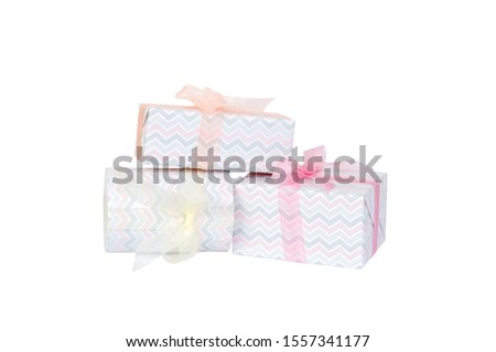 Group of Christmas or other holiday handmade present in colored paper with pink, yellow and orange ribbon. Isolated on white background, top view. thanksgiving Gift box concept.