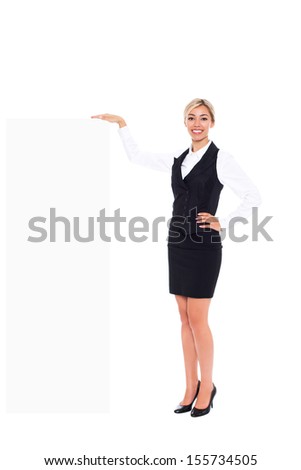 businesswoman holding a blank white card board, signboard, showing an empty bill board, young business woman happy smile, full length isolated over white background