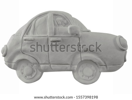 Colorless car handmade with play dough or clay. Isolated on white background.– Image
