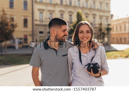 romantic couple tourists exploring new city