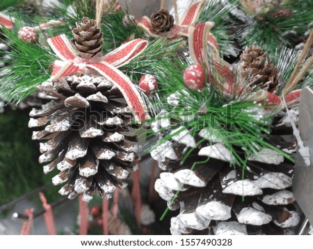 Close-up beautiful large bright Christmas decorations for the holiday on sale in the store