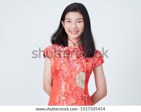 Portrait of asian woman in traditional chinese dress isolated on white background. Chinese new year.