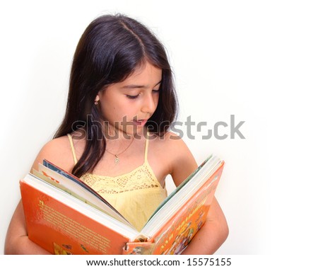 8 year old girl holding a large book