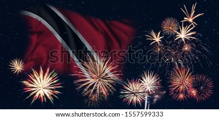 Holiday sky with fireworks and flag of Trinidad and Tobago, independence day of country