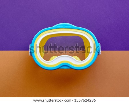 Mask and Snorkel Set Underwater Equipment for Sport and Snorkeling Leisure. Mask for swimming on a colored background.  Concept of summer relaxing. Concept of diving and swimming.
