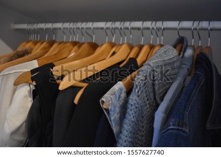 clothes on wooden hangers- gardrobe tour