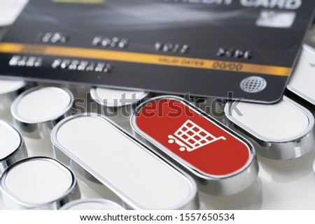 Online shopping icon on keyboard with credit card