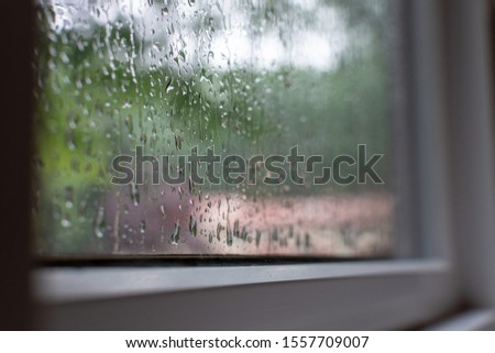 Rain on a window on a rainy day