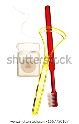 Teeth cleaning supplies on white background