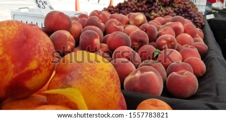 Peach grapes market organic healthy Royalty-Free Stock Photo #1557783821