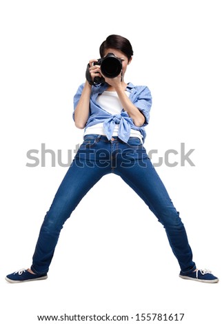 Woman-photographer takes pictures, isolated on white