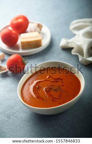 Homemade spice tomato soup with chili oil