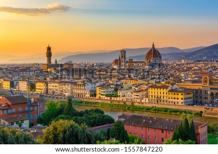 Sunset view of Florence, Palazzo Vecchio and Florence Duomo, Italy. Architecture and landmark of Florence. Cityscape of Florence Royalty-Free Stock Photo #1557847220