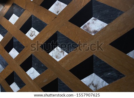 geometric background in the interior on the floor in the form of rhombus of different sizes