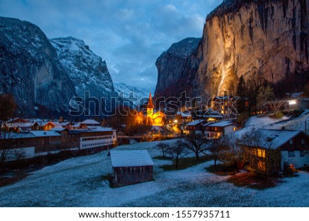 postcard picture of amazing village Lauterbrunnen in the Swiss Alps