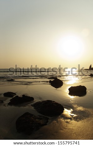 Beach at sunset, Goa, India