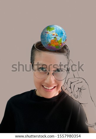 Close up skinhead woman with planet Earth glove in her head. Elements of this image furnished by NASA