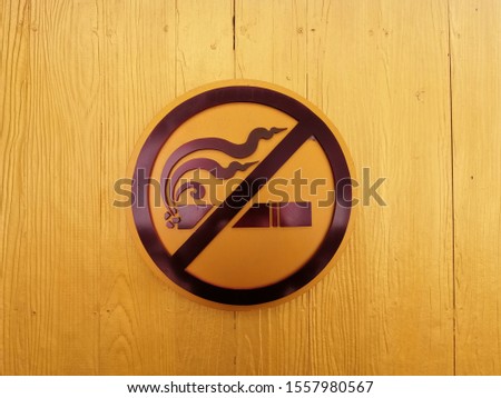 no smoking signage in yellow tone