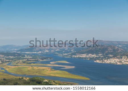 View of the Miño river and the Portuguese shore, from the ascent to the Santa Tecla mountain in A Guarda, Galicia, Spain, near the mouth