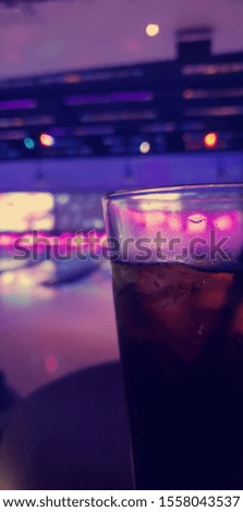 Half glass with blurred background 