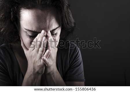 Close up of depressed woman Royalty-Free Stock Photo #155806436