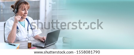 Portrait of mature female doctor during online medical consultation; panoramic banner