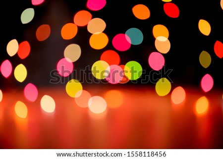 Abstract colorful defocused circular facula holiday bokeh. Abstract Christmas and new year background