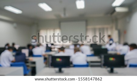 Education concept, Blurred student study computer in classroom for background.