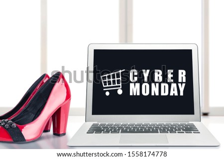 Cyber Monday advert on the laptop screen on the desk. Cyber Monday concept