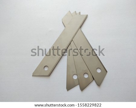 Segmented blade or snap-off blade utility knife isolated on white with clipping path
