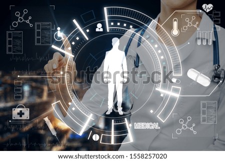 Doctor pushing creative glowing medical interface. Medicine and tech concept.
