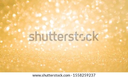 light glitter texture christmas abstract background yellow christmas
