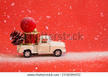 Christmas card with New Year's retro toys on a red background. Minimalism concept, 60s style. Happy holidays