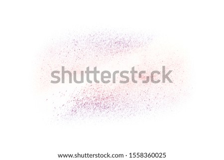 Colorful powder/particles fly after being exploded against white background

