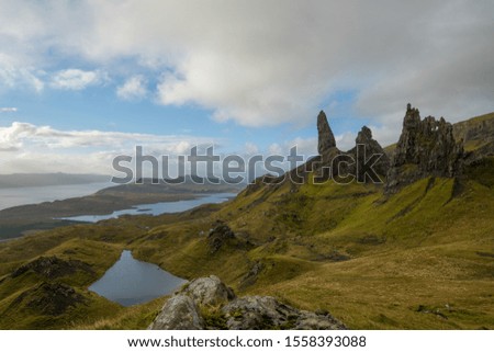 This is a picture from the Scottish Highlands on a cloudy day showing the Old Man of Storr in the morning.  