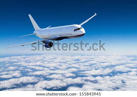 Airplane in the sky - Passenger Airliner / aircraft Royalty-Free Stock Photo #155843945