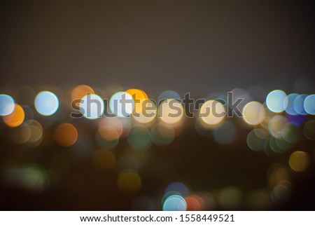 The lights at the annual festival are photographed to create bokeh. Suitable for use as a background