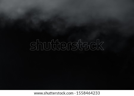 Smoke come from top on black background. Like soft blur fog