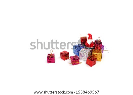 Santa Claus and christmas gifts on white background                