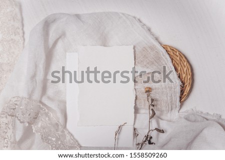 Festive wedding, birthday table setting with cards, dry branches. Blank card mockup. Restaurant menu concept. Flat lay, top view