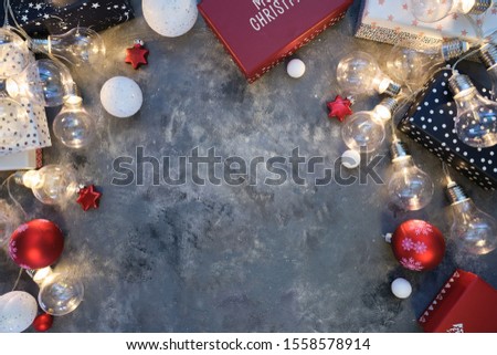 Rustic Natural Christmas background on textured dark grey background. Copy space for text, flat lay, top view. Corner frame.