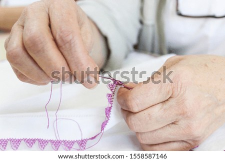 Woman making money by sewing