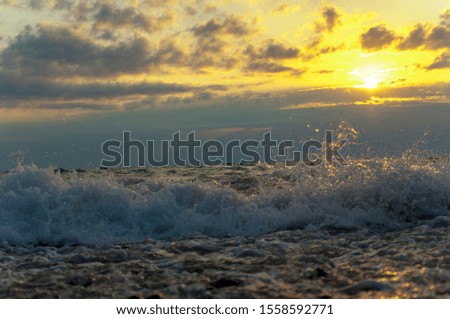 waves and sea at sunset