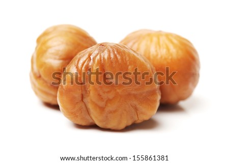 chinese food, peeled roasted chestnut on white background  Royalty-Free Stock Photo #155861381