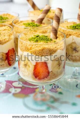 magnolia dessert with strawberries and banana on tray