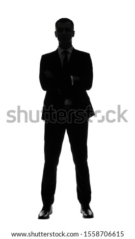 Silhouette of handsome businessman on white background Royalty-Free Stock Photo #1558706615