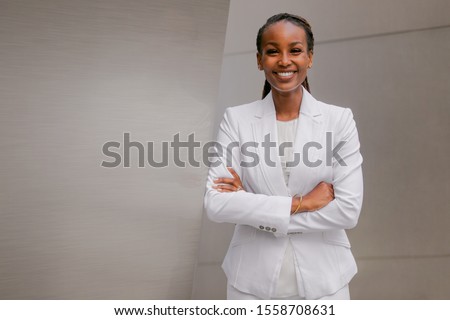Portrait of a confident and successful african american business woman, financial investor, representative, executive, sales, corporate entrepreneur  Royalty-Free Stock Photo #1558708631
